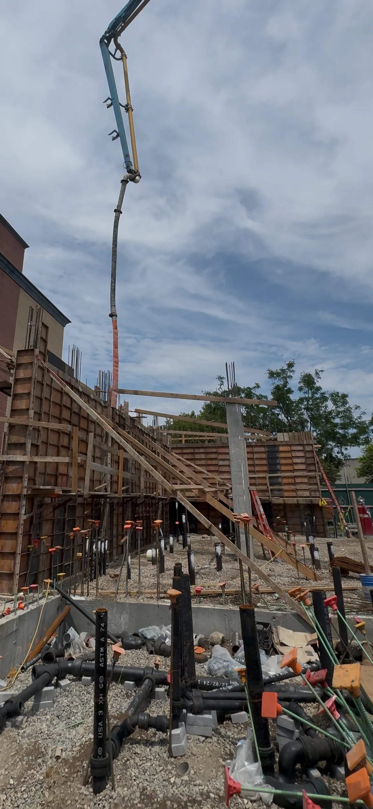 Commercial foundation construction with concrete pump in New York City