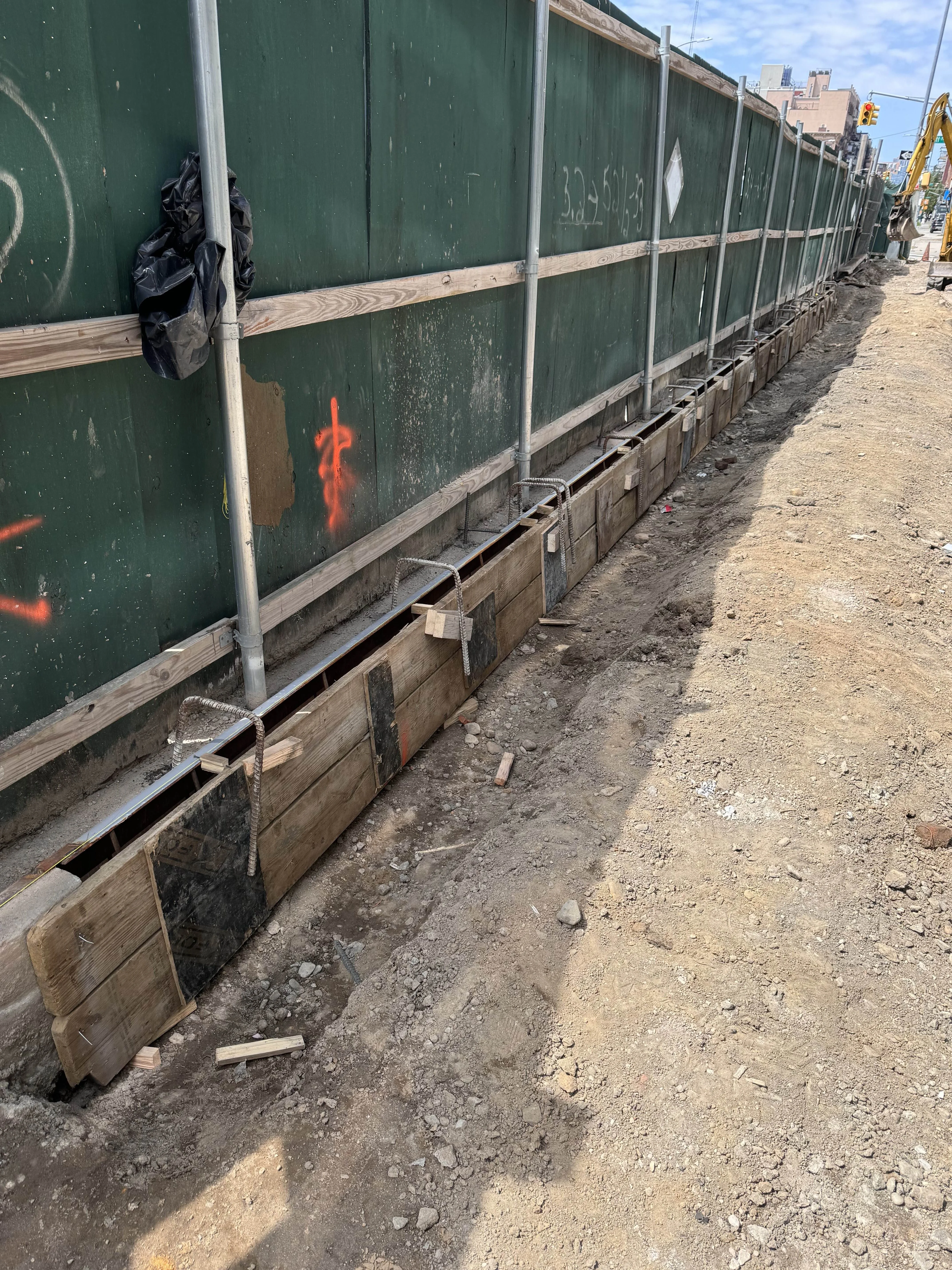 Foundation formwork and rebar along construction site in New York City