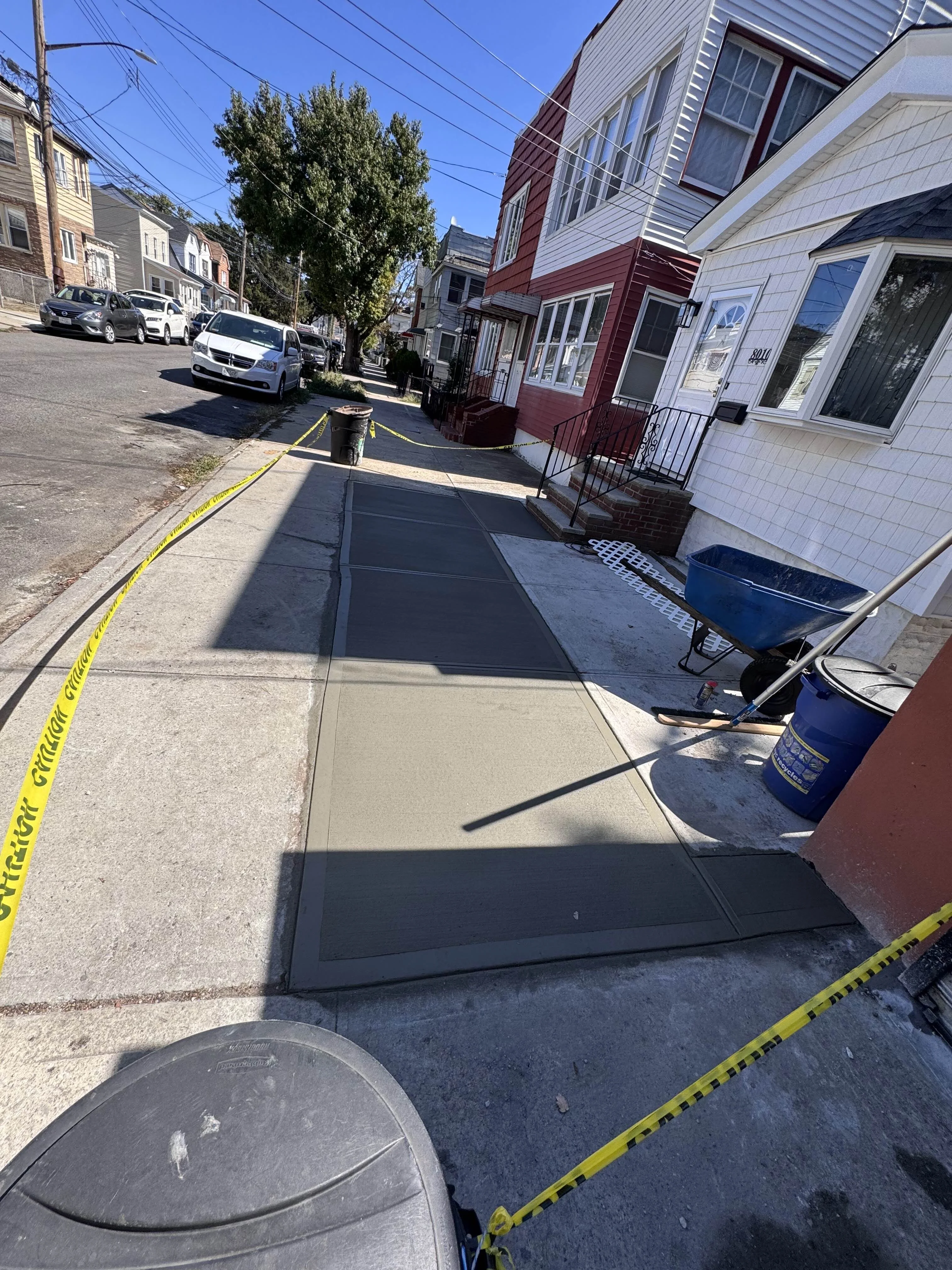 Fresh concrete sidewalk installation in New York City