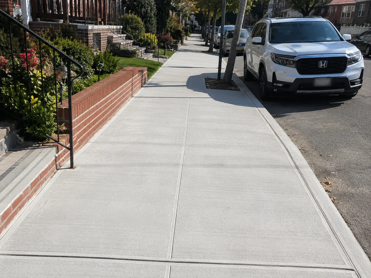 New concrete sidewalk installation